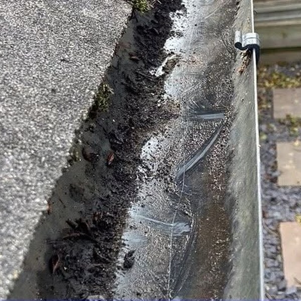 gutter-cleaning-after The same gutter cleared and flowing after a GCS gutter clean