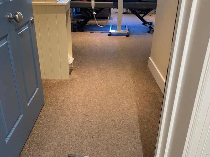 Resident room, carpet cleaned carefully around care equipment